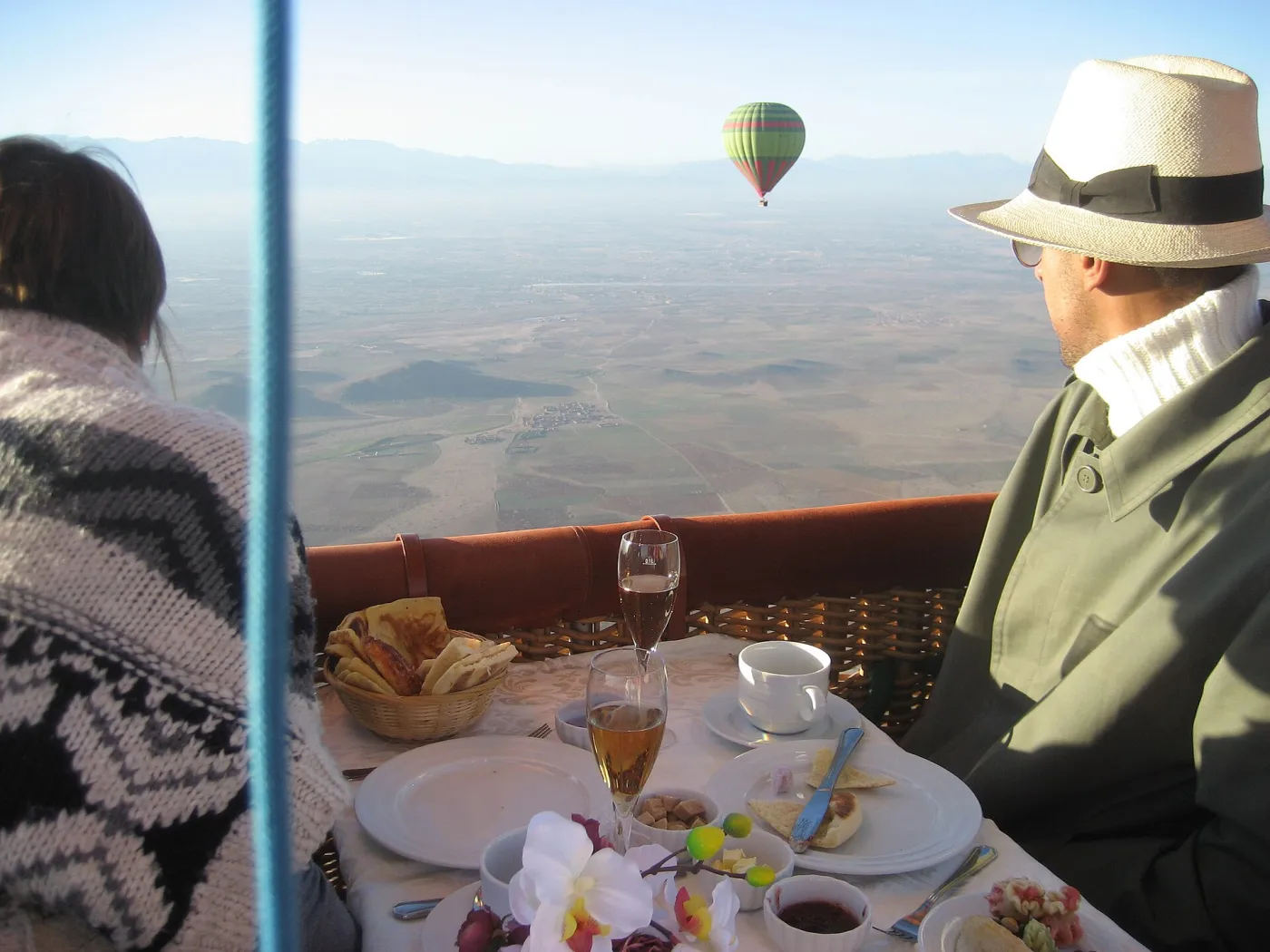 Hot air balloon basket above the countryside near Marrakech