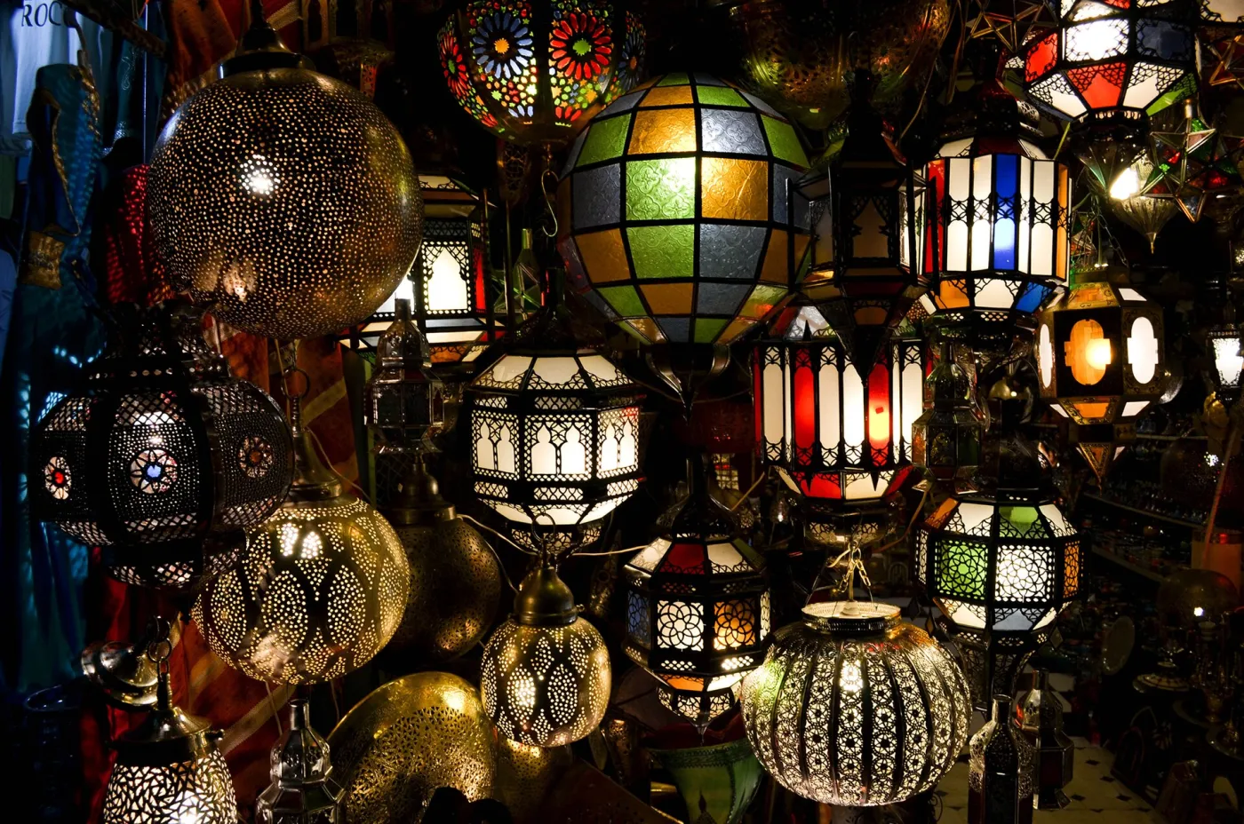 Marrakech lanterns Moroccan brass lanterns glowing in a Marrakech shop